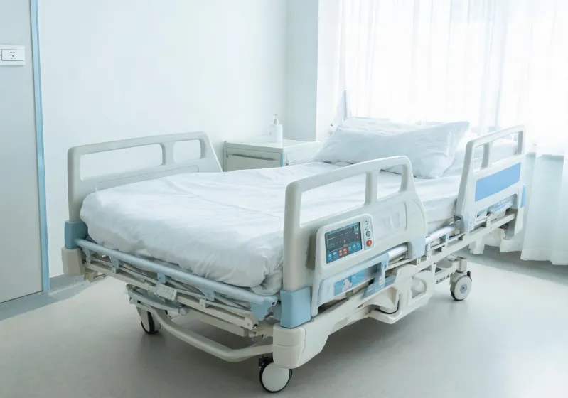 Smart hospital bed with siderails and status panel